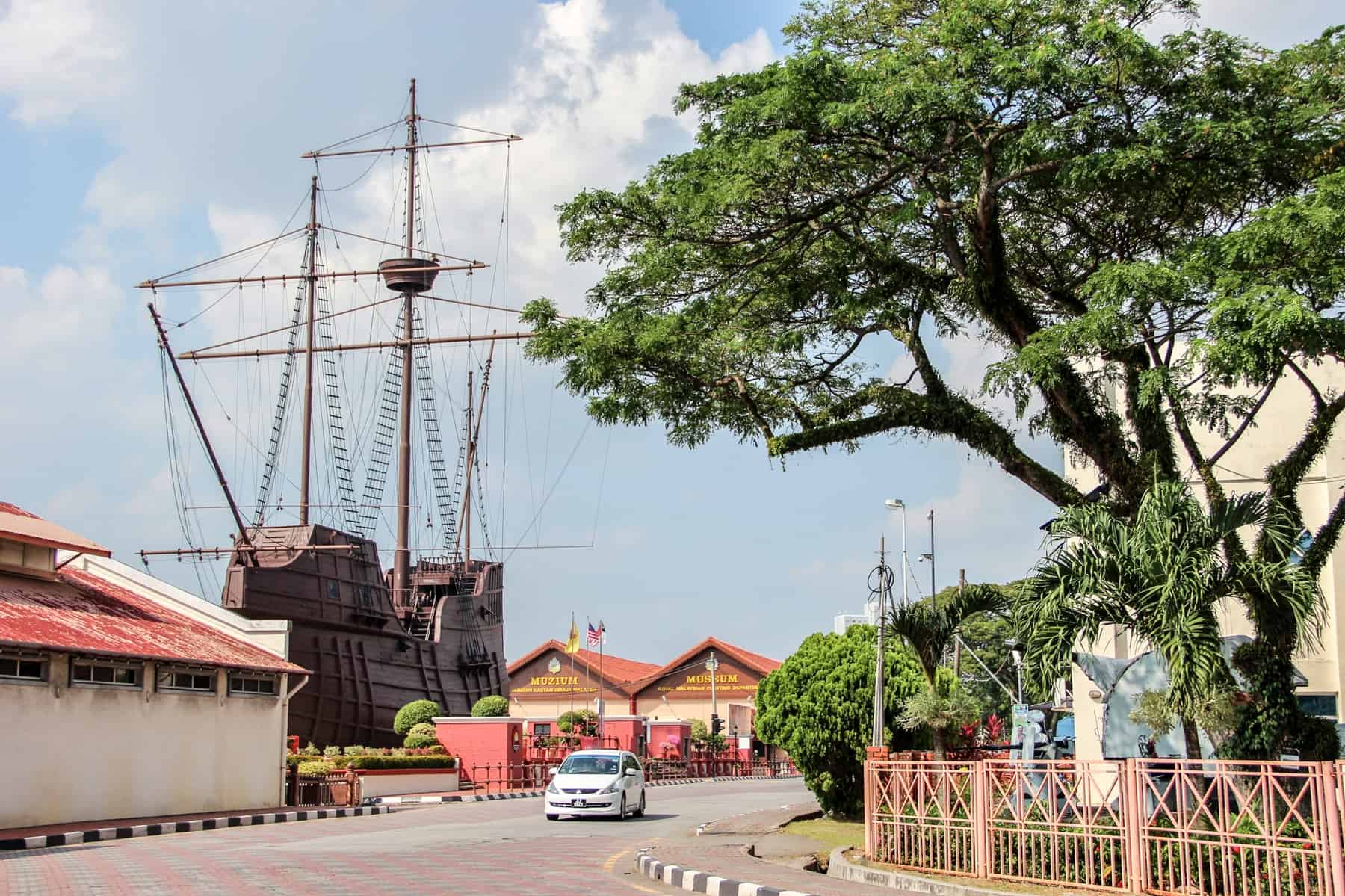 A old vessel structure next to a main road in Melaka, Malaysia