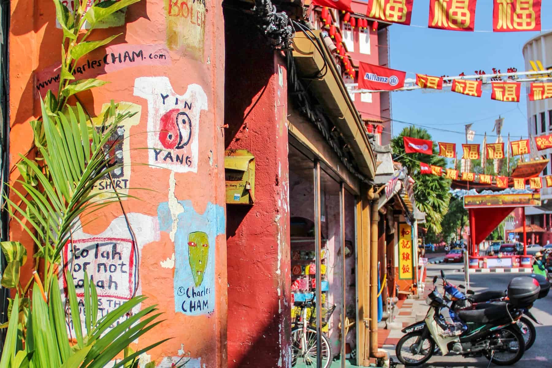The colourful orange and red decorated streets of Chinatown seen on a Melaka trip in Malaysia