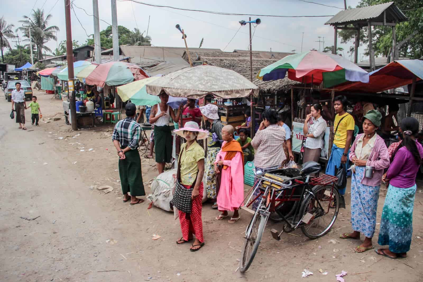 Locals waiting to ride the Yangon Circular Train in Myanmar