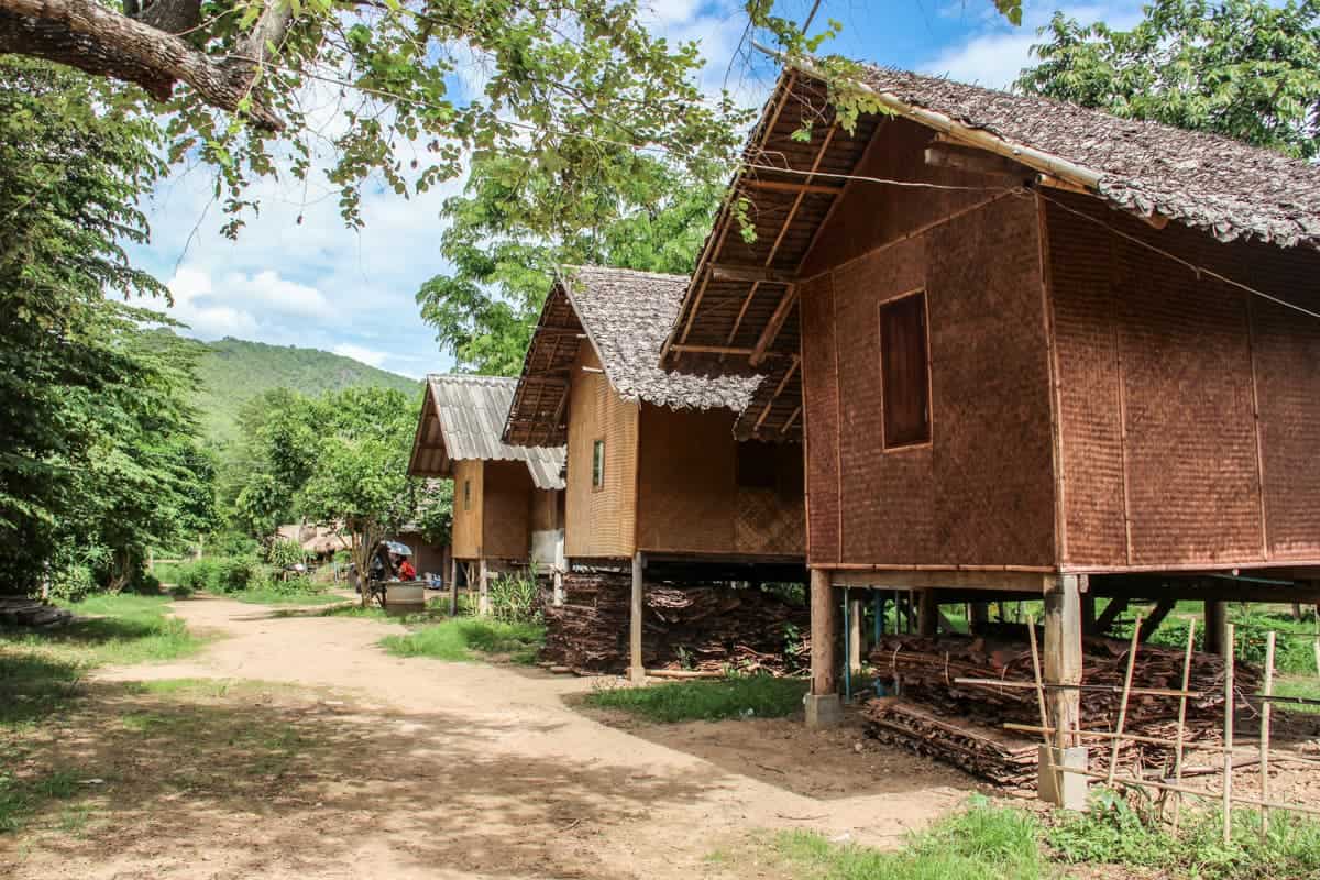 Wooden hut accommodations set in the countryside area of Pai in Northern Thailand