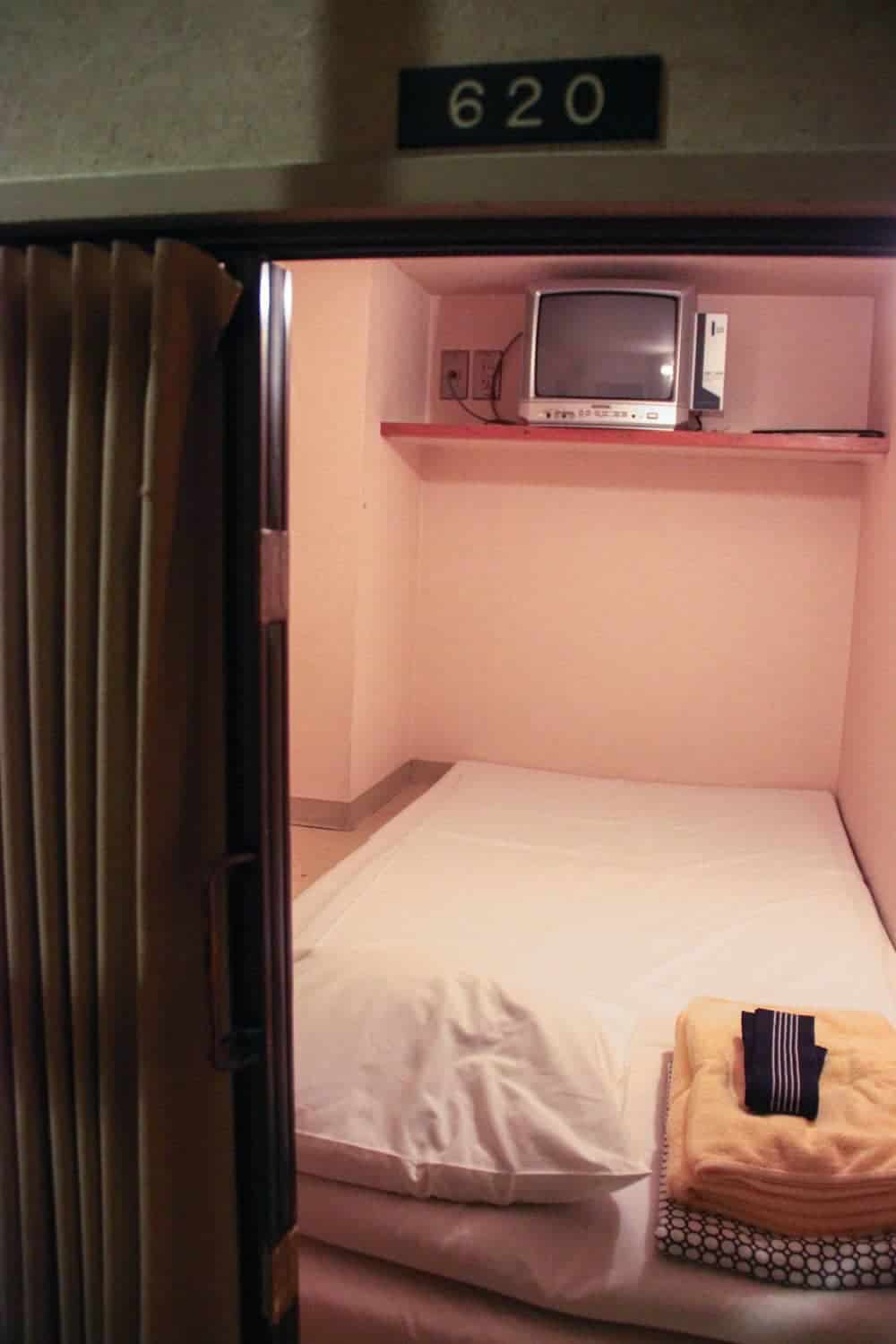 A typical capsule at a Capsule Hotel in Japan