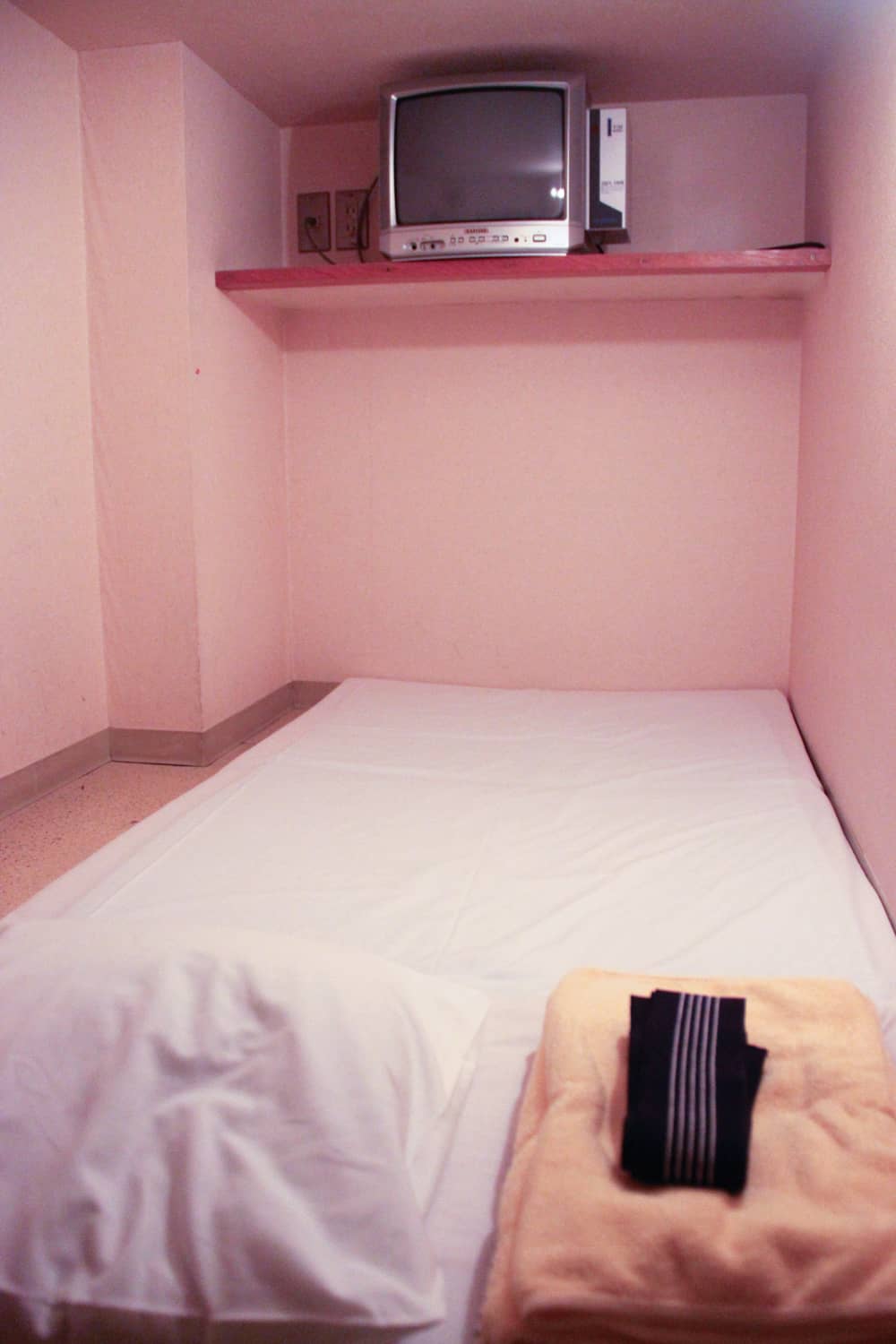 What does a capsule bed look like in a Capsule Hotel in Japan?