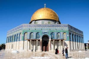 The white and aqua blue building with a golden dome that is Temple Mount in Jerusalem, Israel