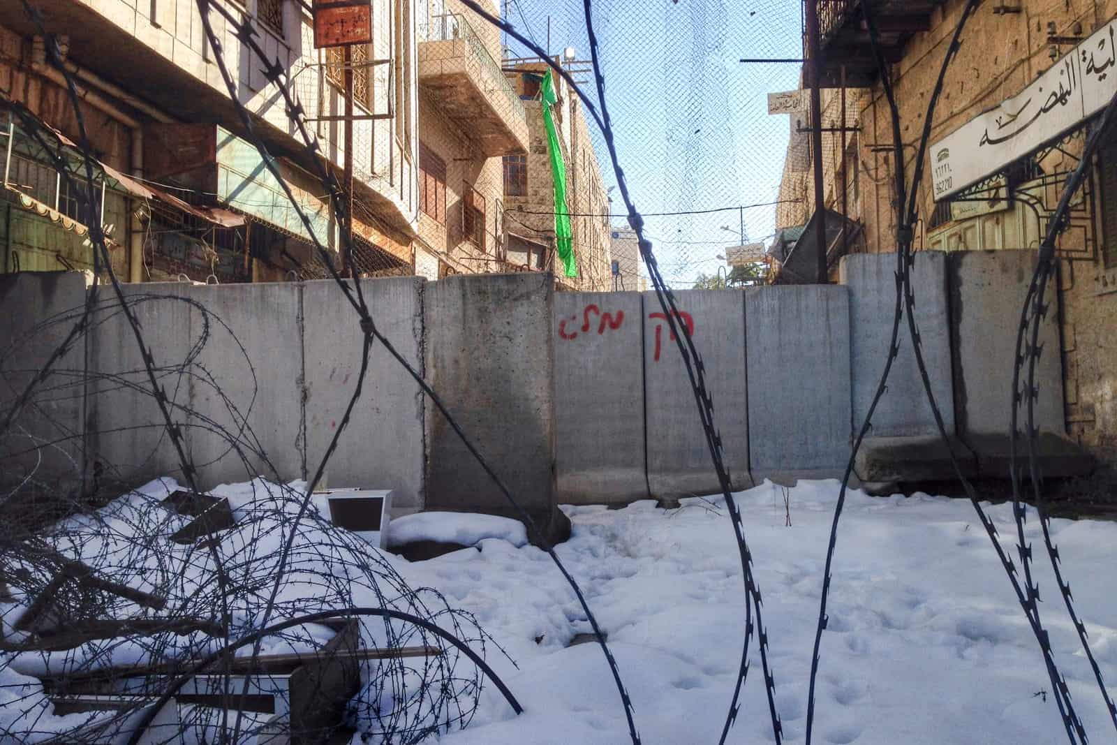 Walls and barbed Wire fences separating the Jewish and Arabs areas of Hebron in the West Bank