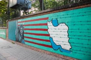 The anti American artwork depicting the Statue of Liberty as a skull and the American flag turning into lines barbed wire, outside the former US Embassy in Tehran known as the 'Den of Espionage'
