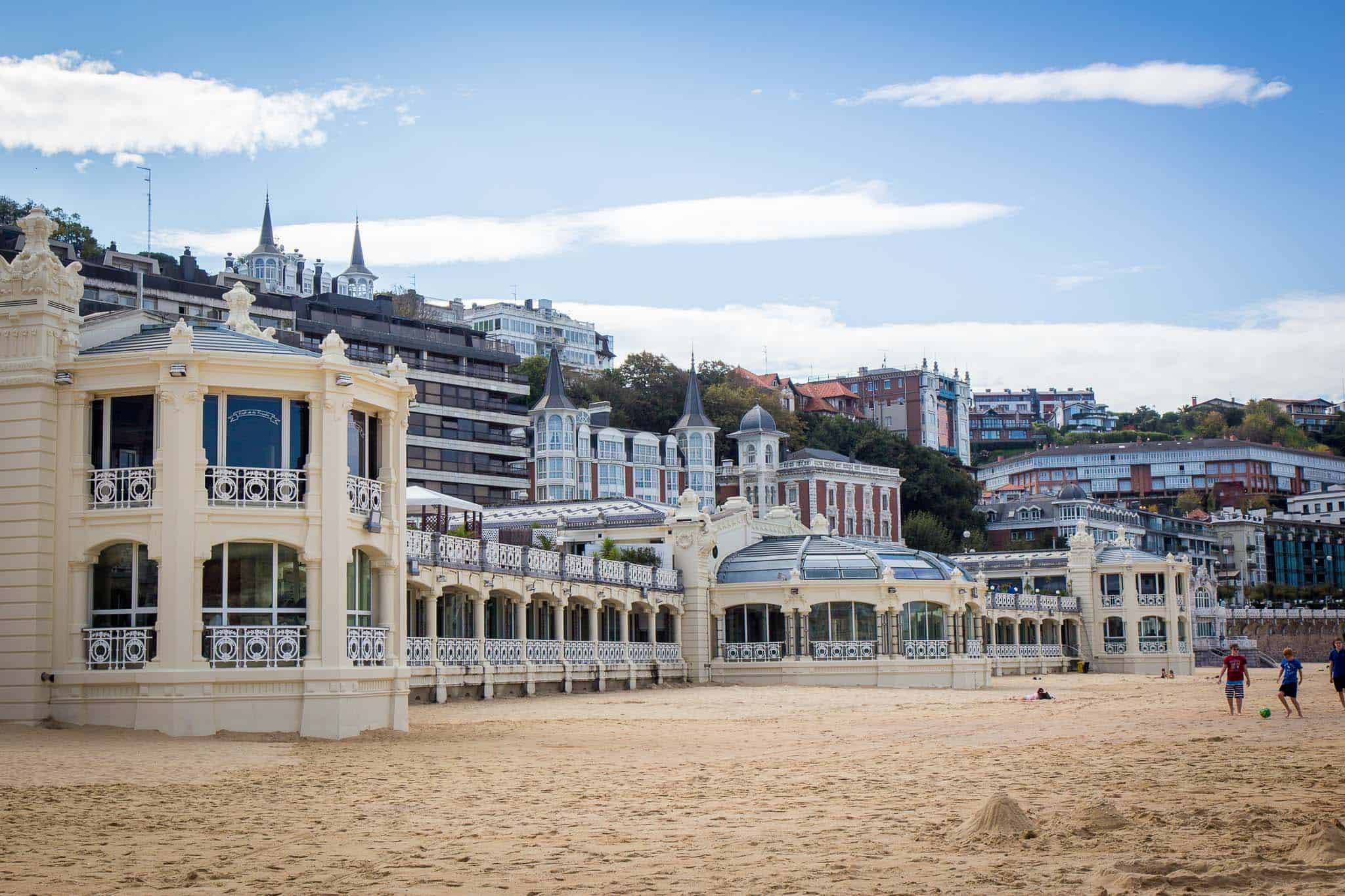 The beautiful cream coloured, balcony lined, La Perla spa in San Sebastian that stands on the beach. 