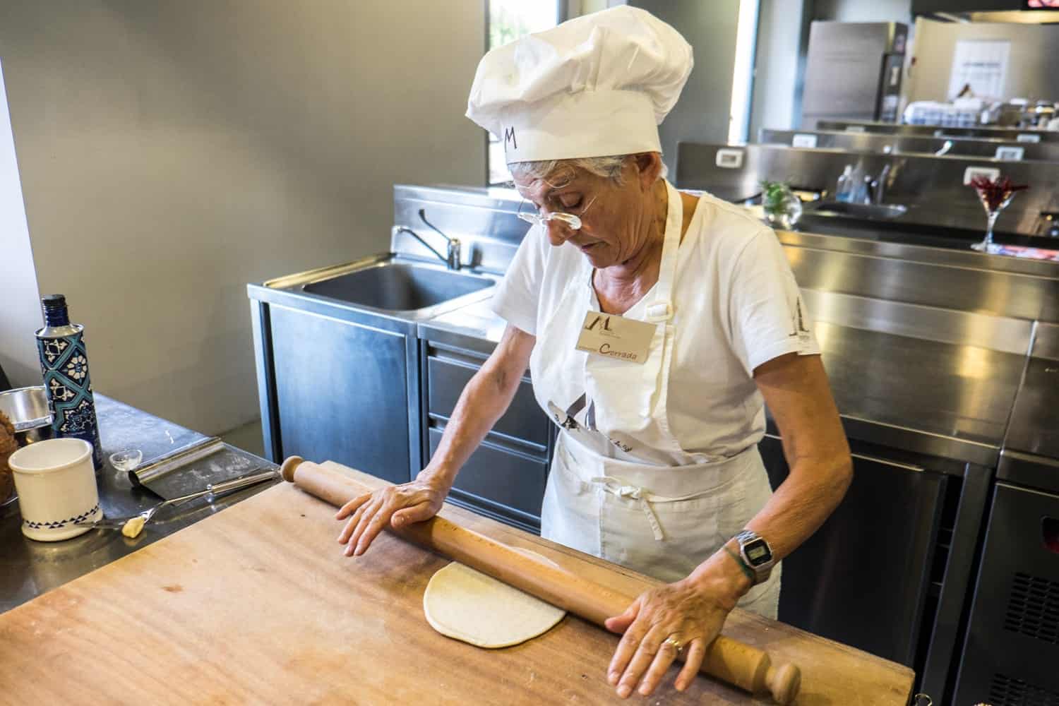 Learning how to make Piadina at Casa Artusi during Festa Artusiana in Forlimpopoli, Italy