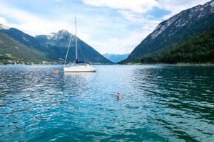 A woman bathing in Achensee Lake, Tirol, Austria
