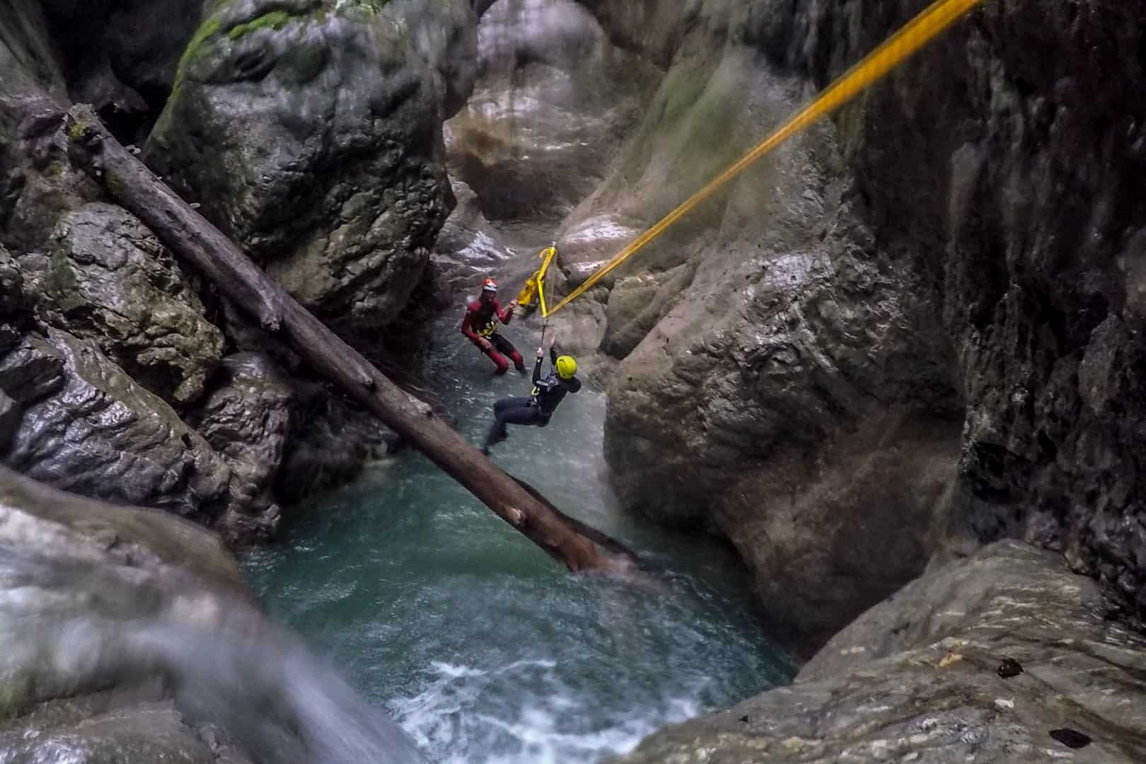 Self-made zipline when canyoning in Vorarlberg, Austria