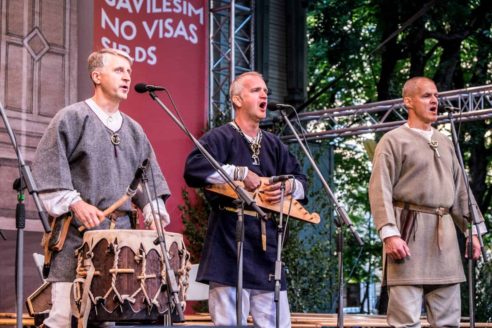 Music performers on stage in a Riga Park for the Song and Dance Celebration in Latvia