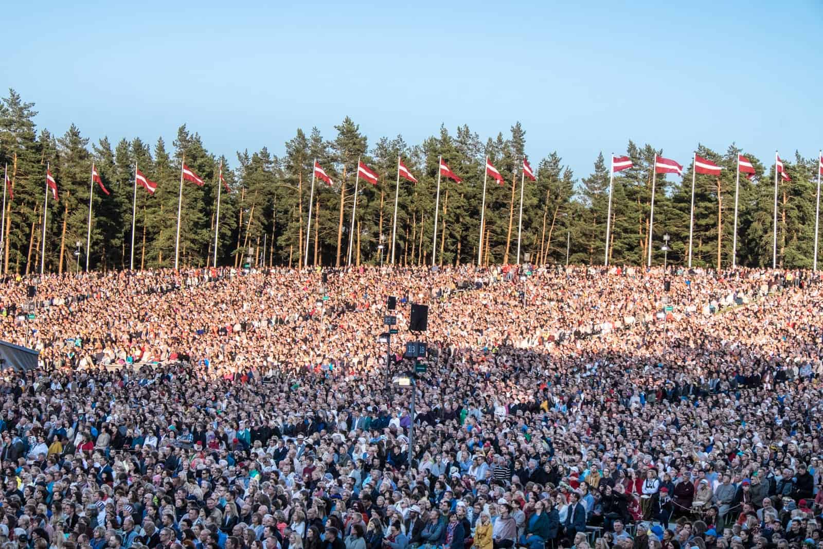 Thousands of people in the crowd at the closing event of the Song and Dance Celebration in Latvia