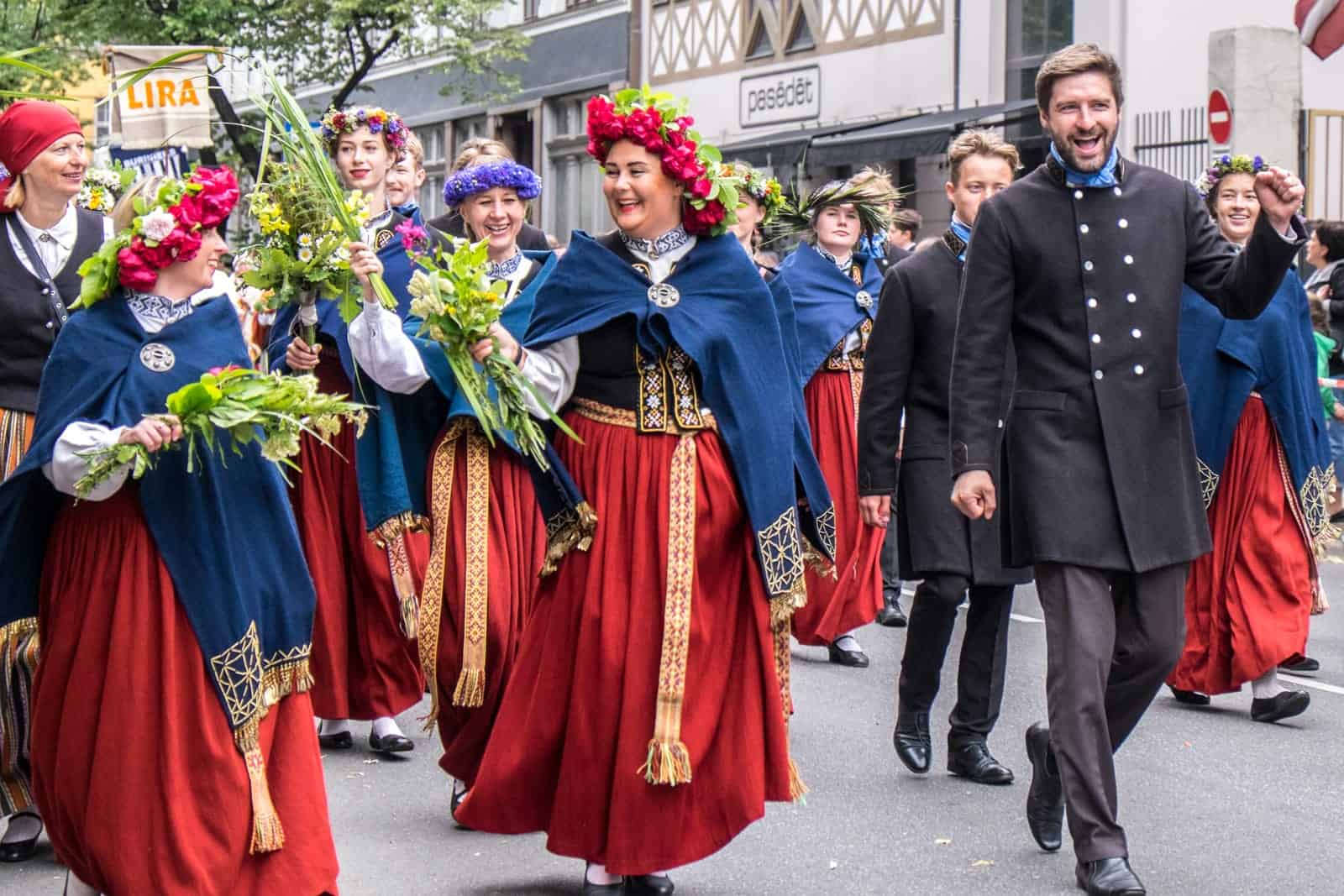 Latvians parading in the opening event of the Song and Dance Celebration in Riga, Latvia