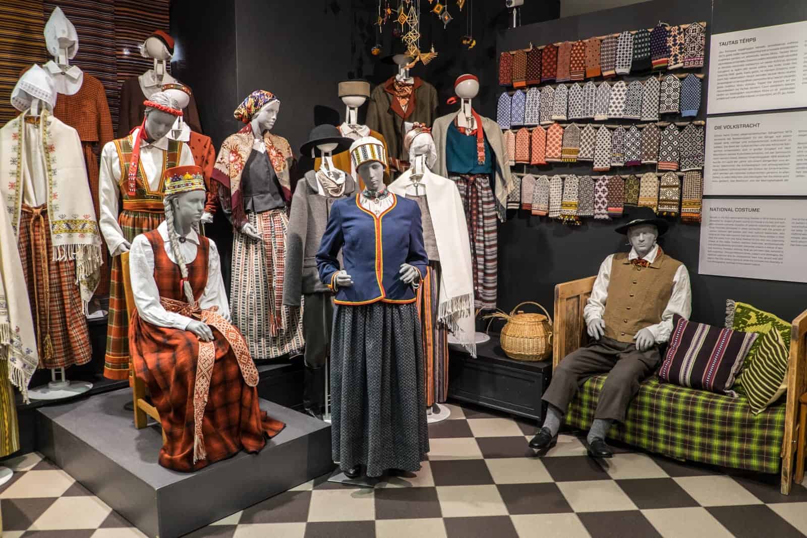 Mannequins showcasing Latvian folk costume in the Senā klēts folk costume centre in Riga Old Town