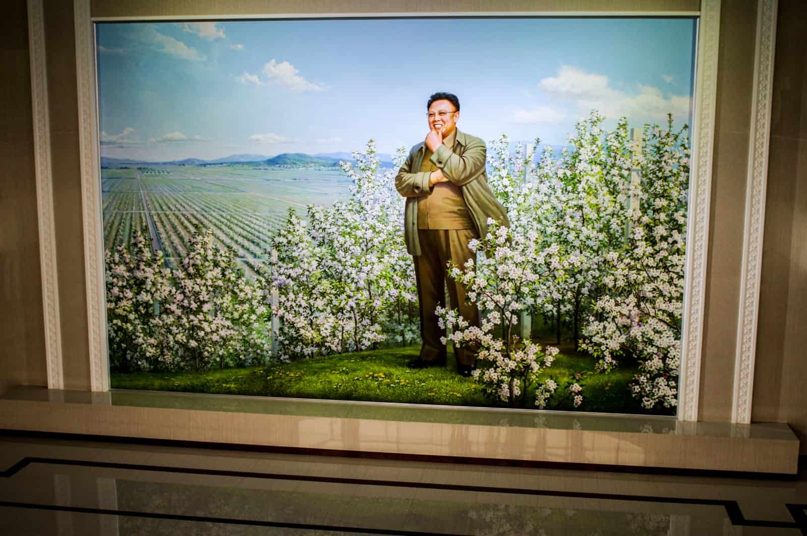 Picture of King Jong Il adorns the apple factory near Pyongyang, North Korea