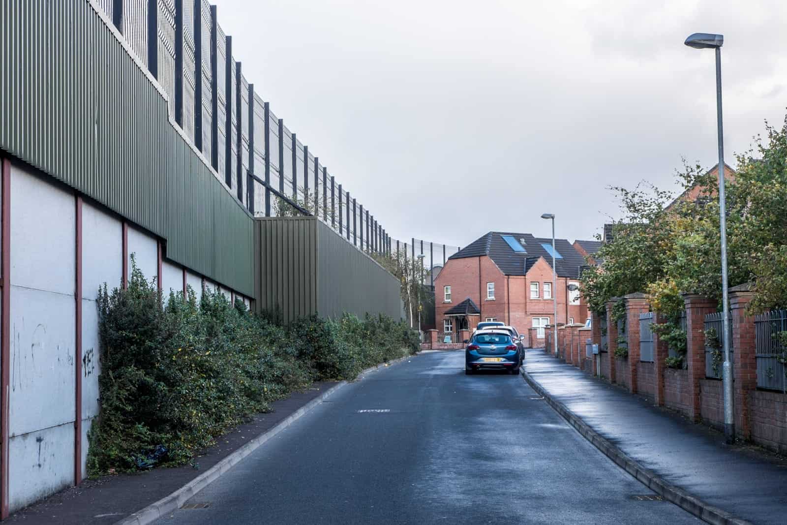 The wall in Belfast dividing Catholic and Protestant neighbourhoods