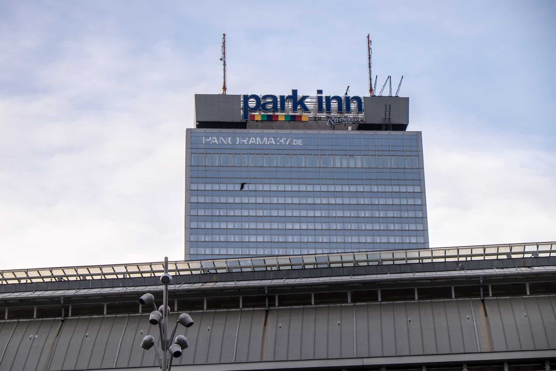 Exterior of the Park Inn Hotel in Berlin, where you can go base flying off its roof as seen by the cranes and set-up on the roof