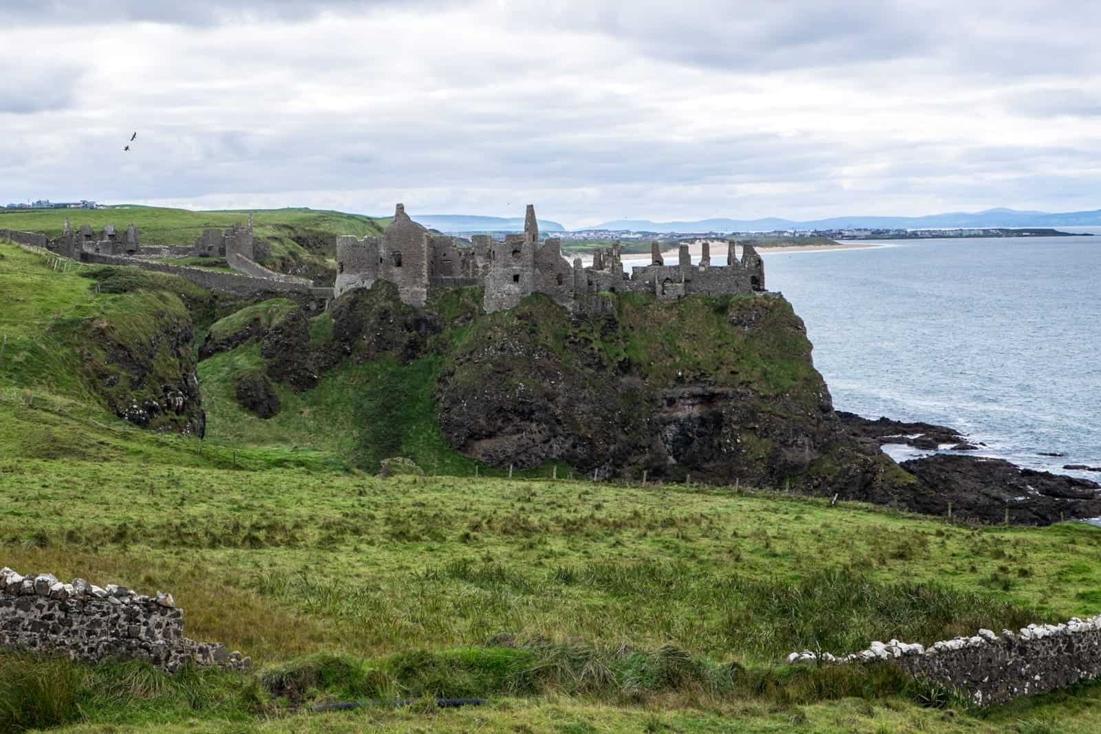 Ruins of Dunluce castle in Northern Ireland Coastal Causeway route