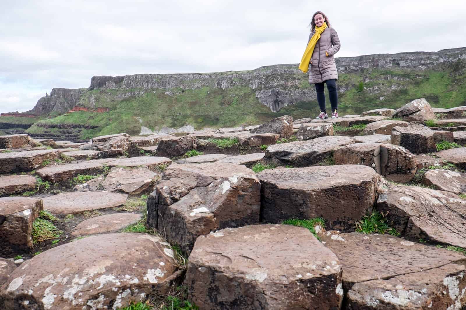 Standing on the Giants Causeway in Northern Ireland