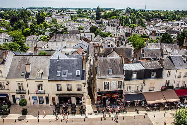 View over a walking street and cluster of old, box houses in Amboise, France. 