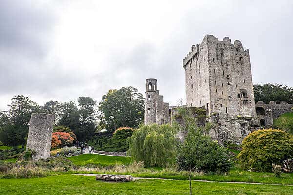 Ancient castle ruins in green parkland in Ireland. 