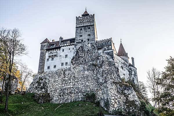 The hilltop stone fortress exterior of Bran Castle in Transylvania, Romania.