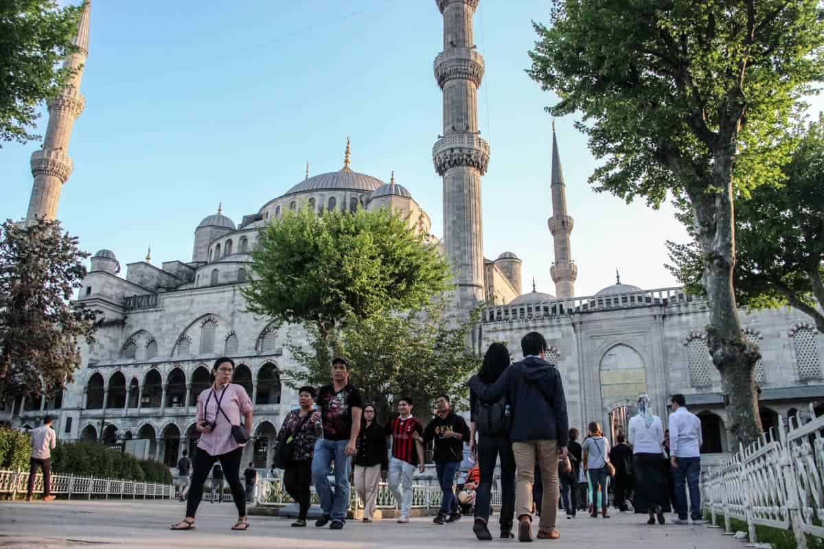 People visiting the Sultanahmet Blue Mosque in Istanbul