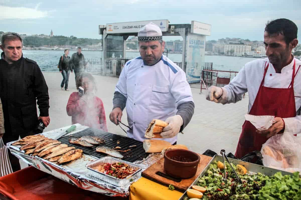 Eating a street food fish sandwich in Istanbul