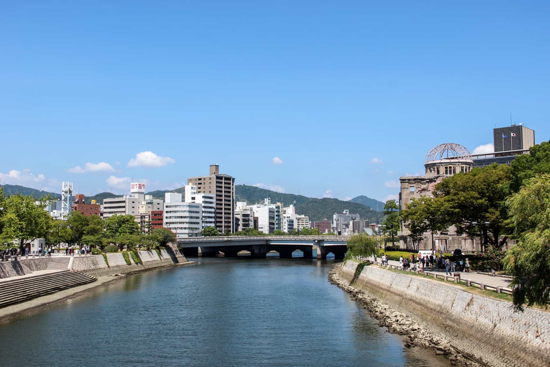 A river bridge connecting Hiroshima modern city with the A-Bomb Dome site the Peace Park Memorial.