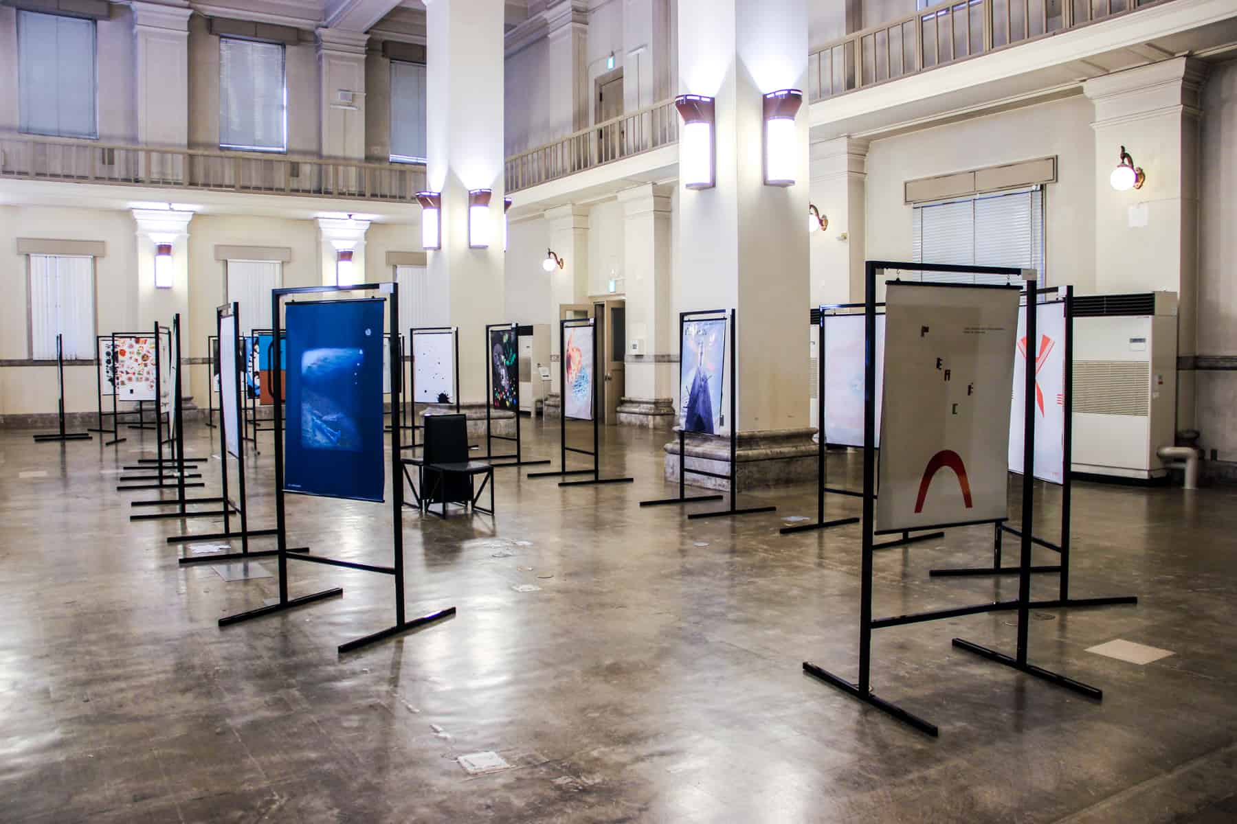 A selection of free standing artworks inside the Peace Poster Exhibition gallery in Hiroshima. 