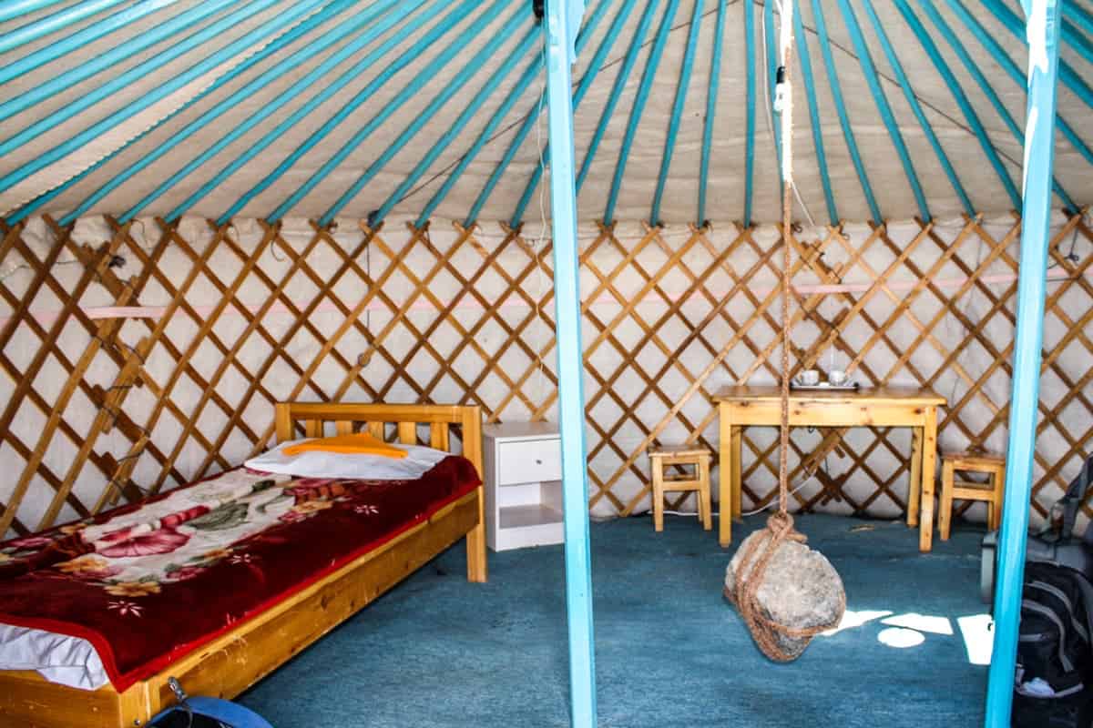The bedroom area of a Mongolian ger yurt made for tourists travelling Mongolia