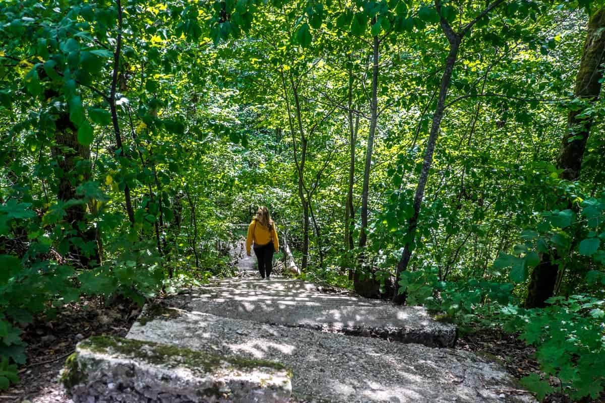 Woman hiking a trail in Sigulda Latvia Gauja National Park