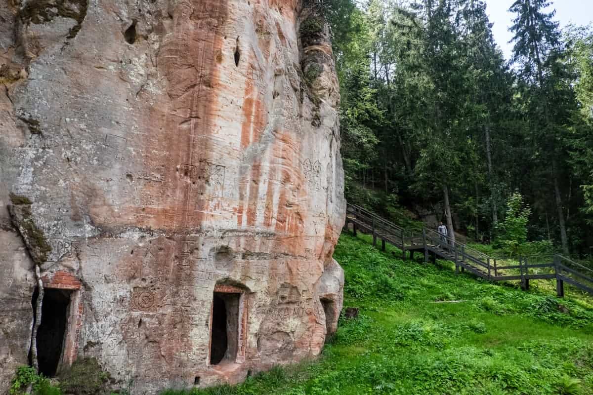 The orange Ligatne caves and starting point of a hiking trail in Gauja National Park Latvia