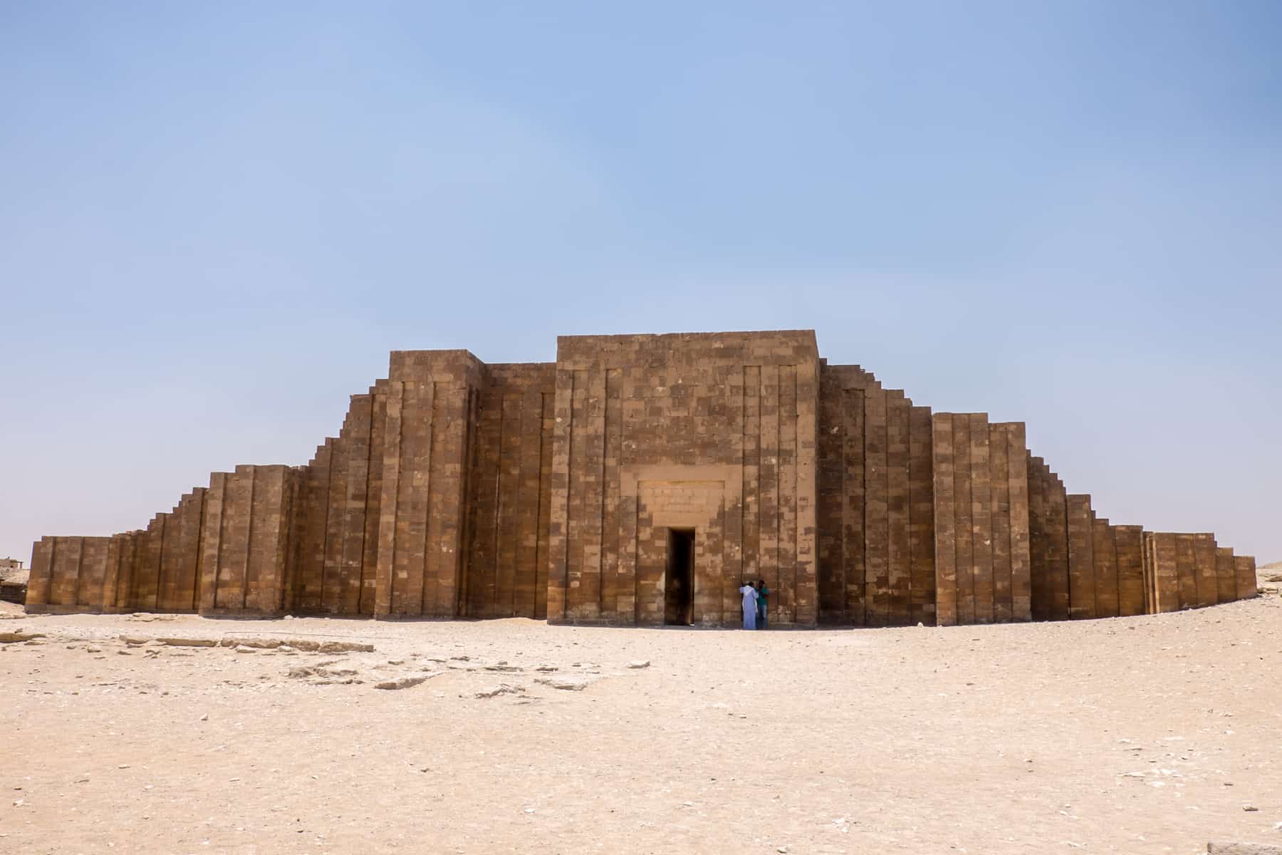 The square, box like temple of Saqqara, Egypt that sits in the desert not far from Cairo