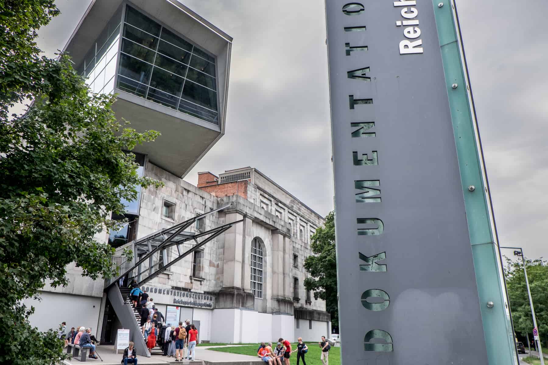 The exterior of the Nuremberg Documentation Centre, where a stake-like structure seemingly cuts through the building of the former Nazi Congress Hall