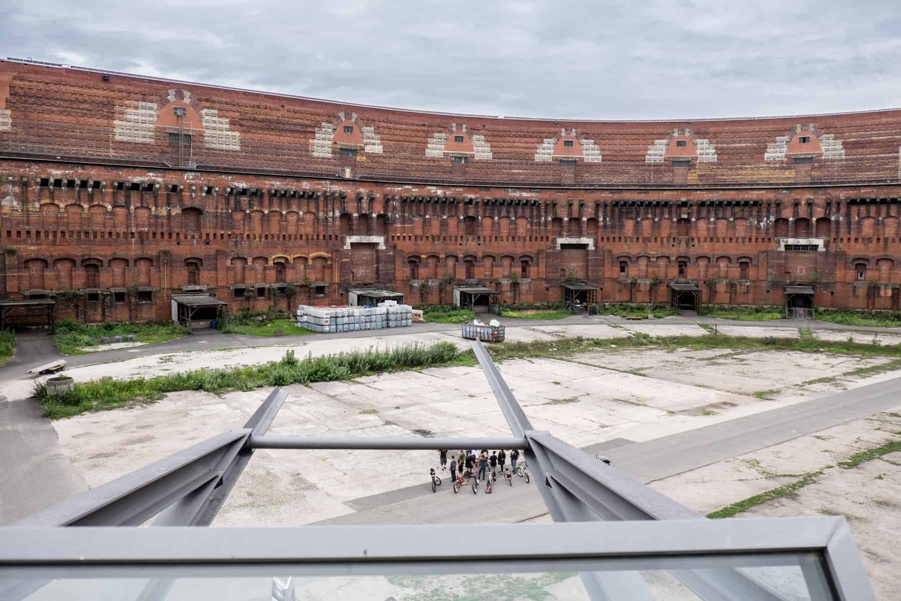 View of the red brick courtyard of the for Nazi Congress Hall as seen from the viewing platform in the Nuremberg Documentation Centre