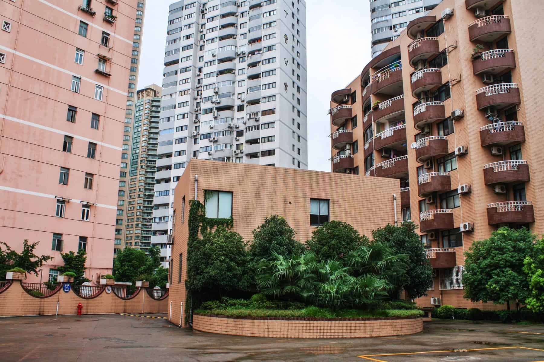 Brown apartment building blocks in Shanghai whose basements conceals the Propaganda Art Museum