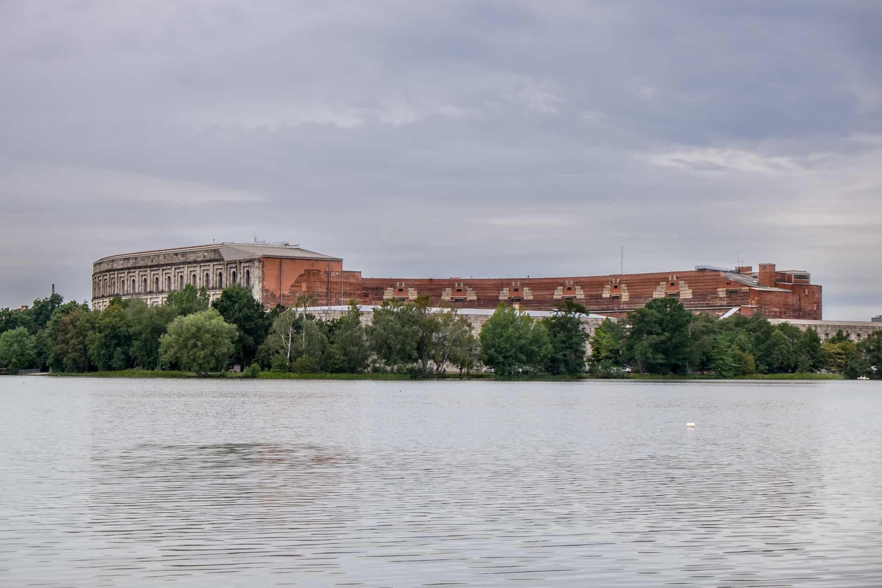 The unfinished Nazi Party Rally Ground site of the Congress Hall in Nuremberg - on the left is the part of the finished marble exterior and on the right the unfinished brick inner courtyard arena