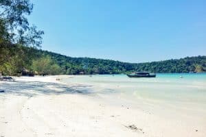 Bright white sands and gleaming turquoise waters illuminated by the sun, of the coastline of Koh Rong Samloem in Cambodia