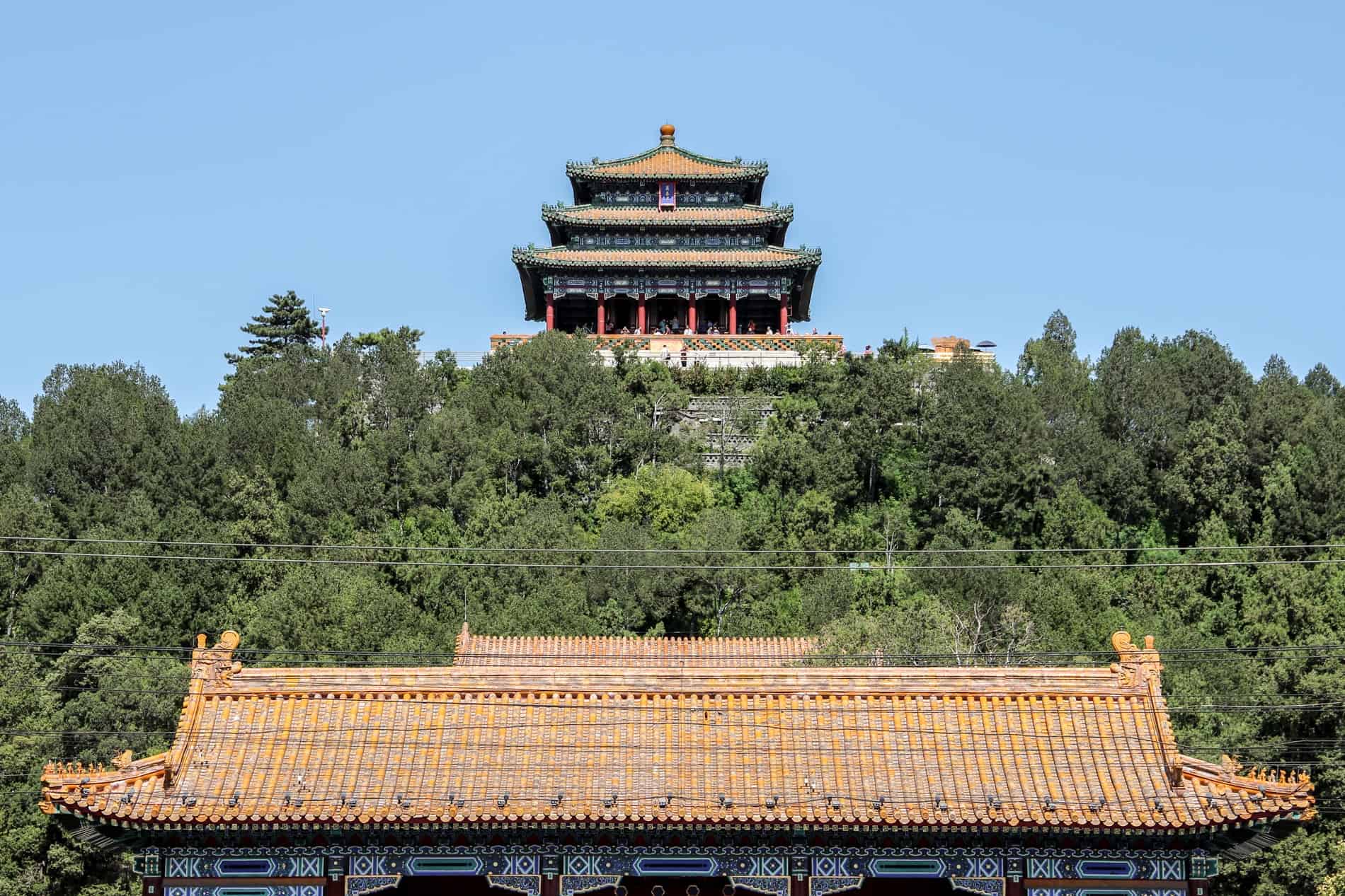 A hilltop Chinese pavilion in the forested Jingshan Park in Beijing. 