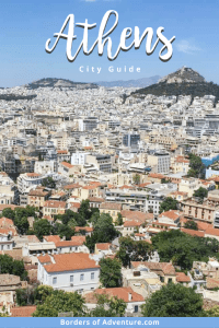 An elevated view of Athens, Greece with a view to the old houses and Lycabettus Hill in the distance