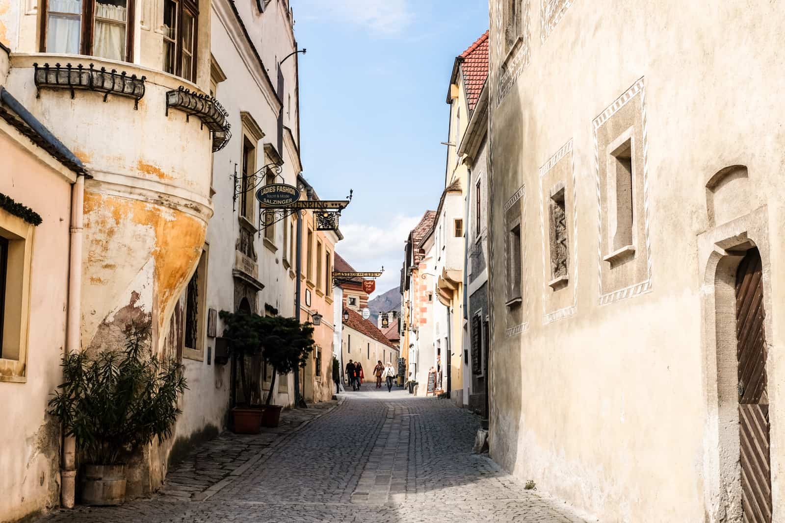The narrow, pastel coloured Medieval and Baroque detailed village streets of Dürnstein
