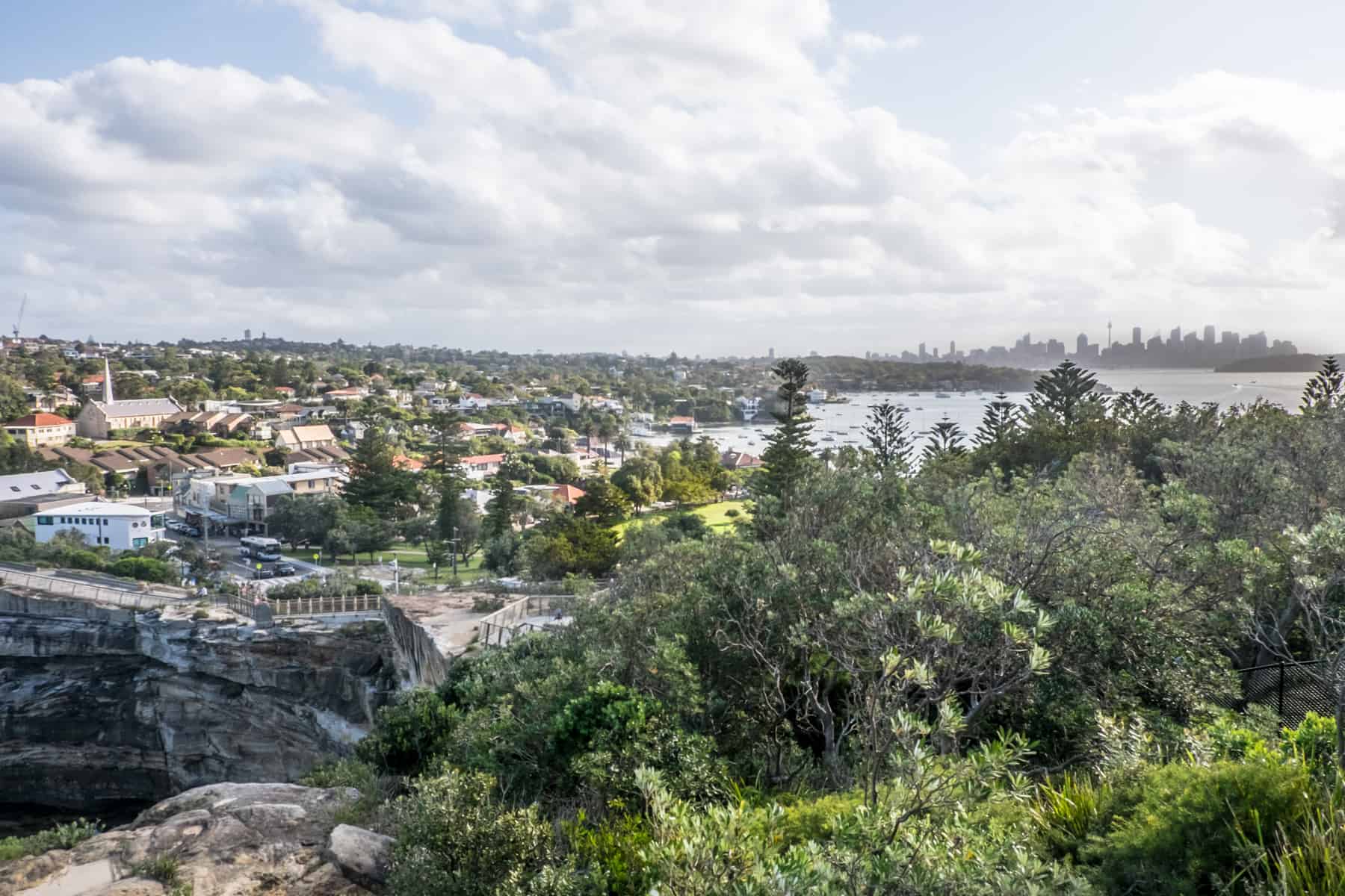 The urban landscape of Sydney with the shadows of the business district skyscarppers in the background