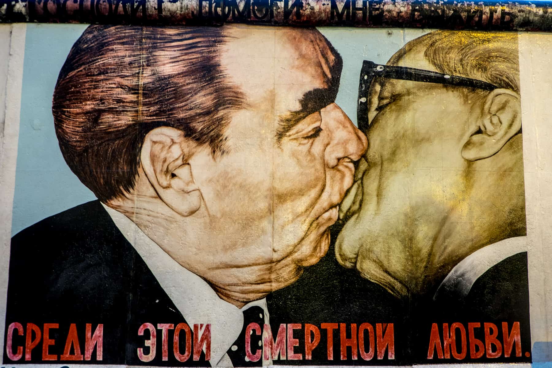 The Kiss artwork on. the Berlin Wall - the most Famous Artwork at the Eastside Gallery 
