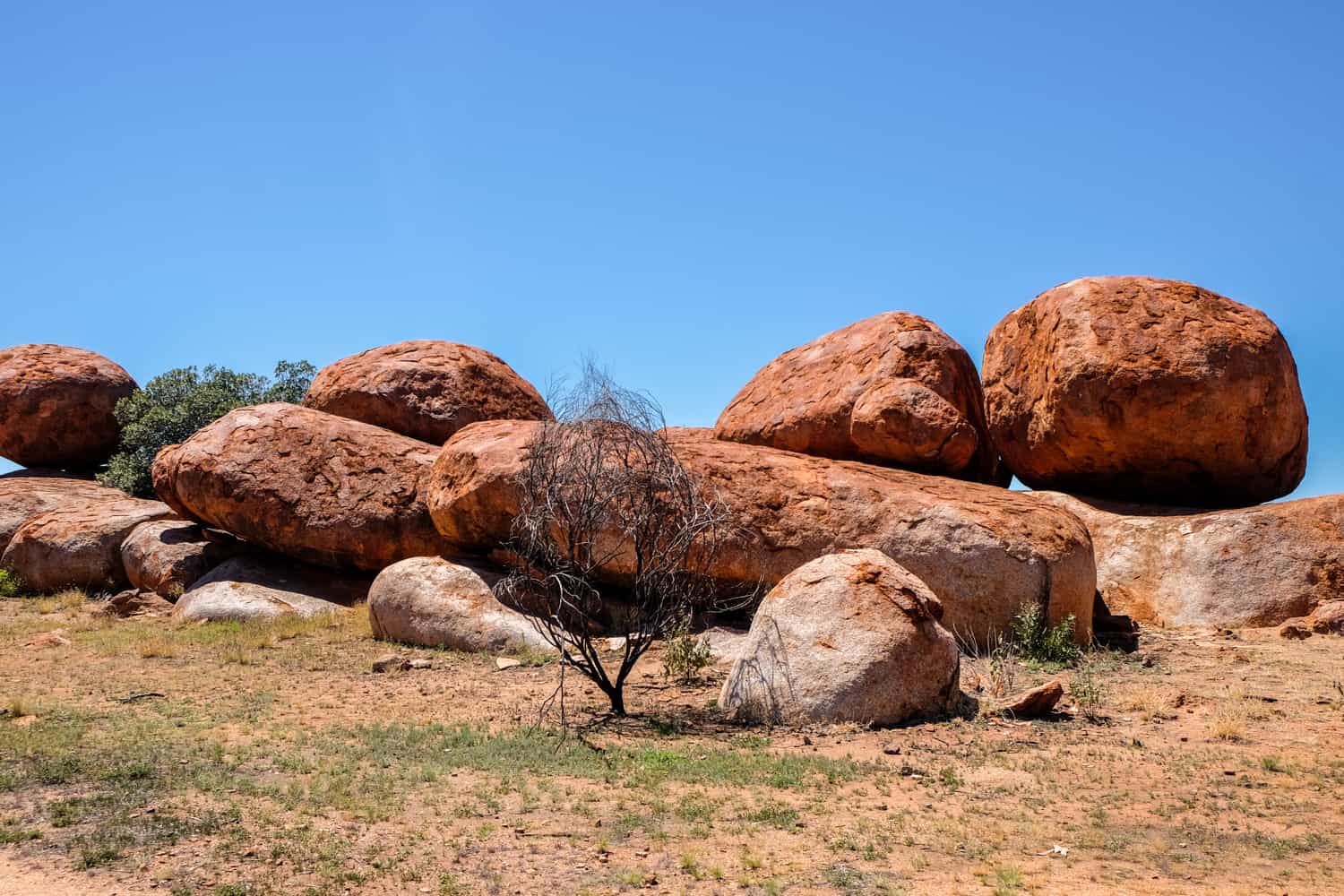 The giant orange boulders of Karlu Karlu Devil's Marbles, seen on an Australian Outback Road Trip.