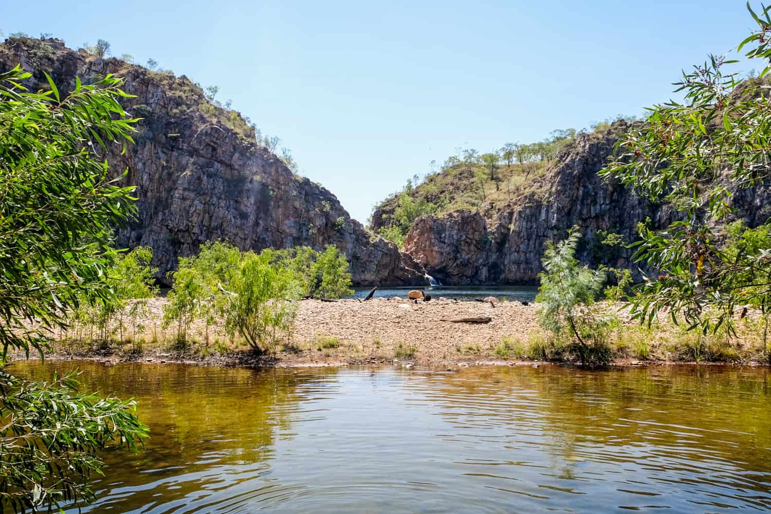 Rock cliffs and lake at Edith Falls, Northern Territory Australia.