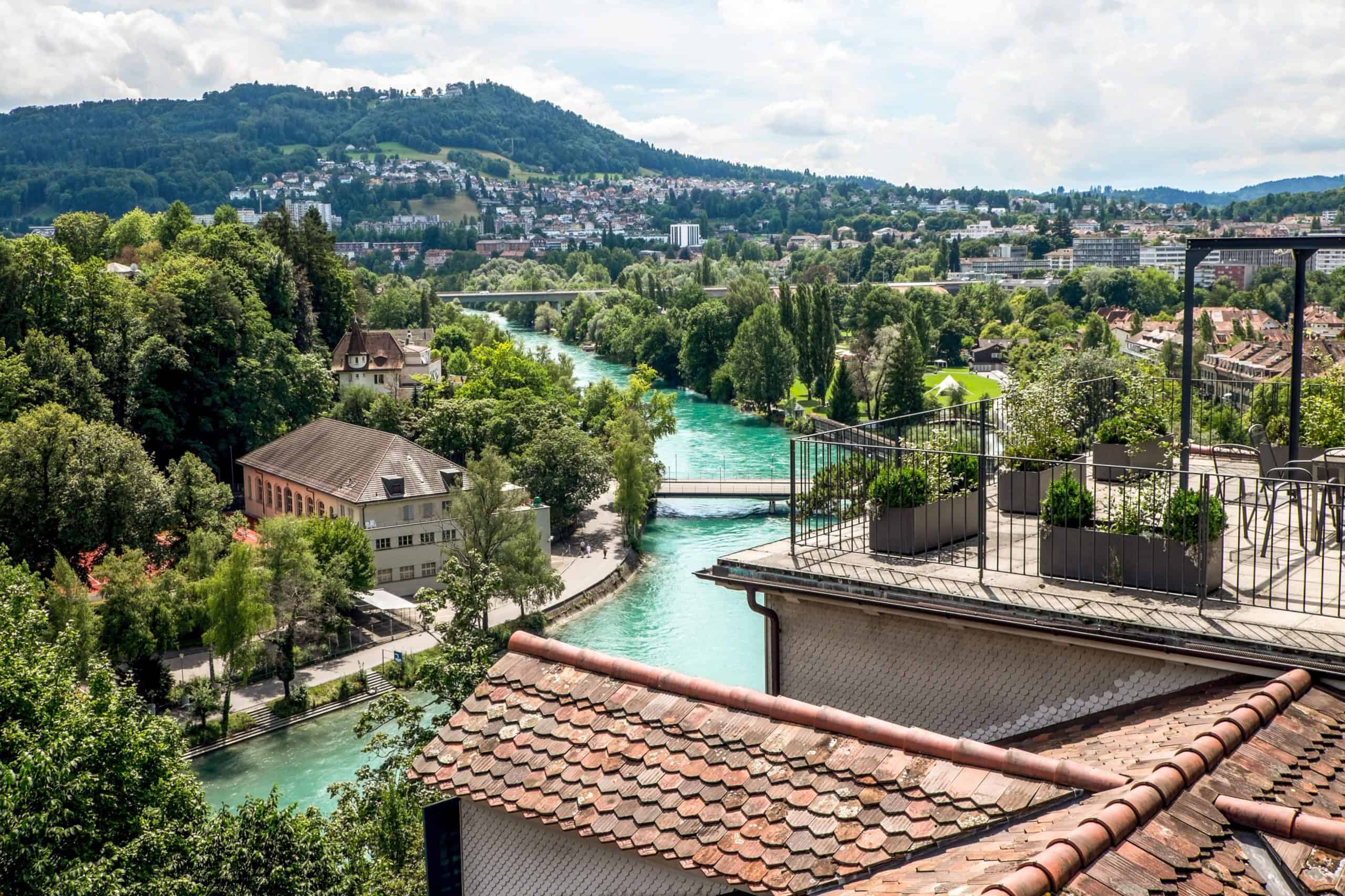 View of the bright aqua Aare river that flows through the city of Bern, Switzerland