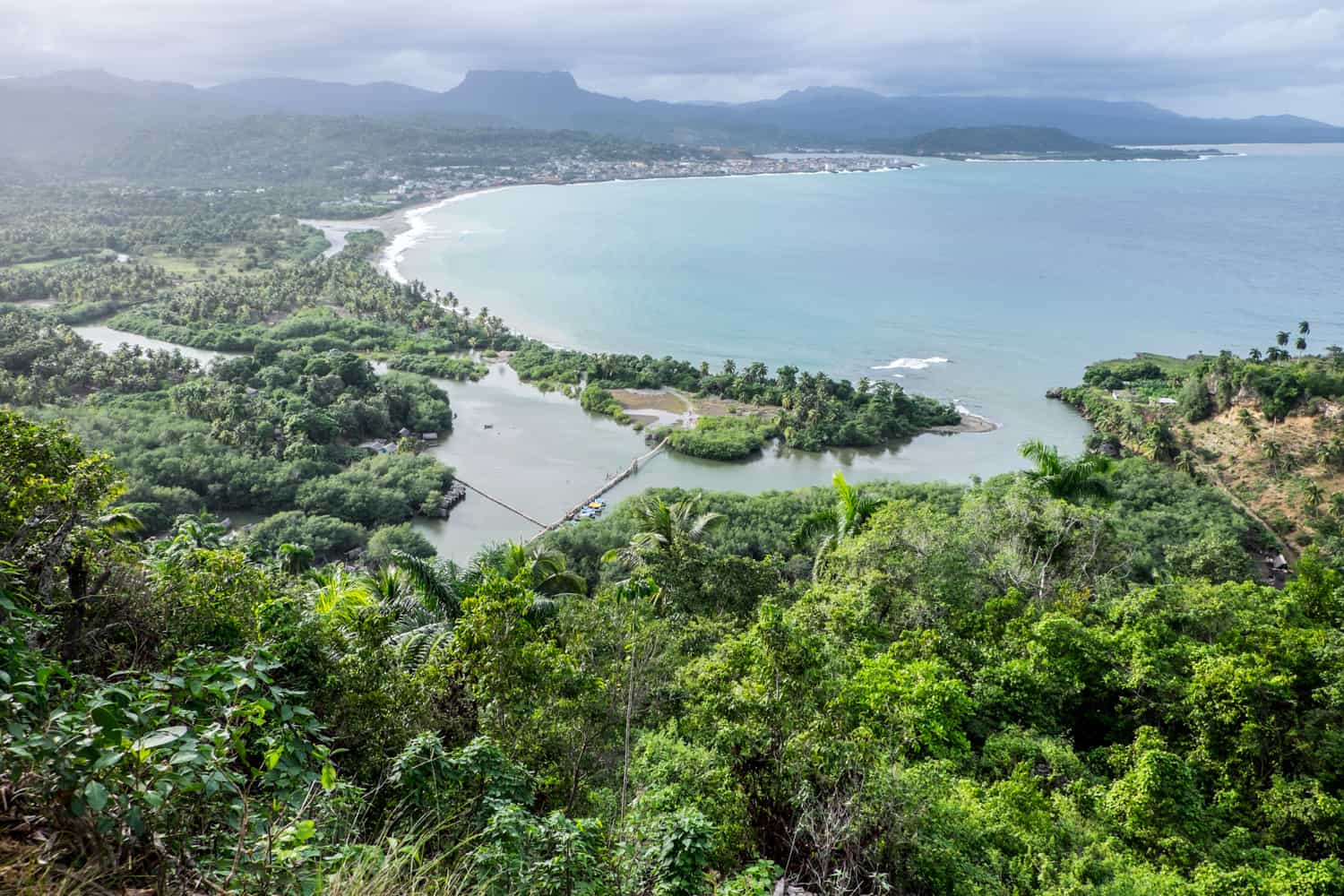 Elevated view of the forest covered bay of Baracoa in Cuba.