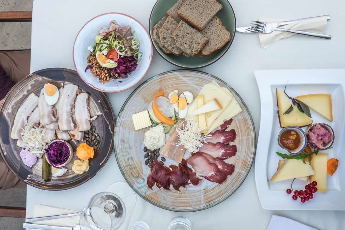 Cold cuts, cheeses and salad - the traditonal food at a Buschenshank (wine tavern) on the South Styrian Wine Road Austria