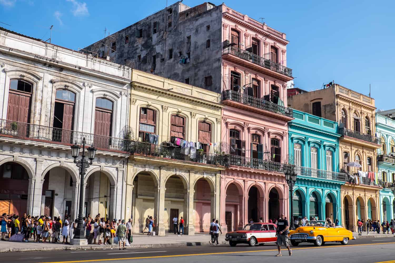 A row of classical pastel coloured buildings in Havana, Cuba. 