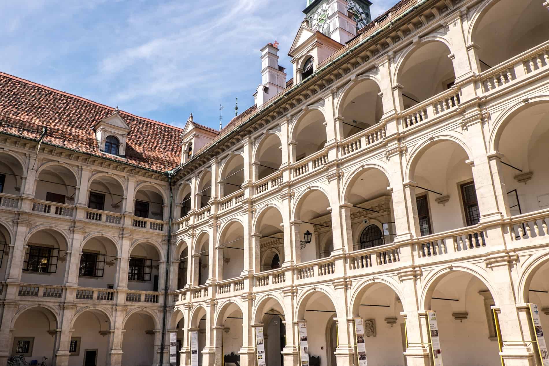 The three-tiered Italian Renaissance arcades of the Landhaus Courtyard in Graz, Austria.